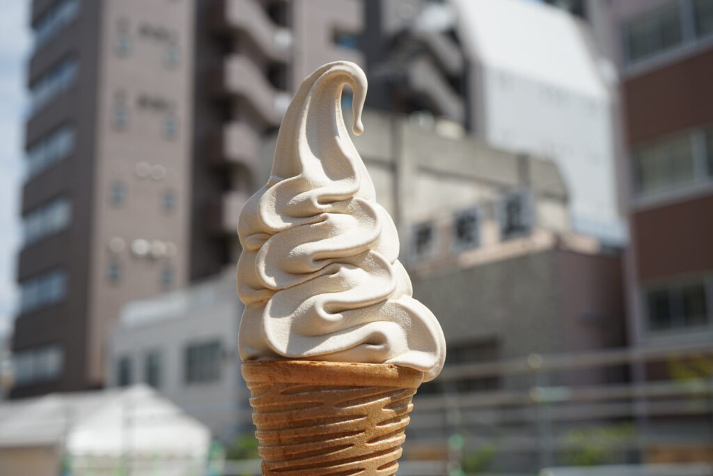 vanilla soft serve ice cream in a cone